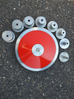 Plastové disky s ocelovou obroučkou s nastavitelnou hmotností 1,25kg-1,6kg, rozměry 1,5kg